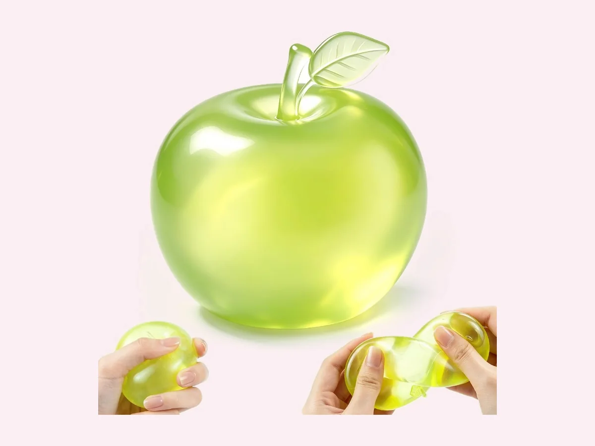 Translucent lime-green apple squishy with a gently squeezed waist