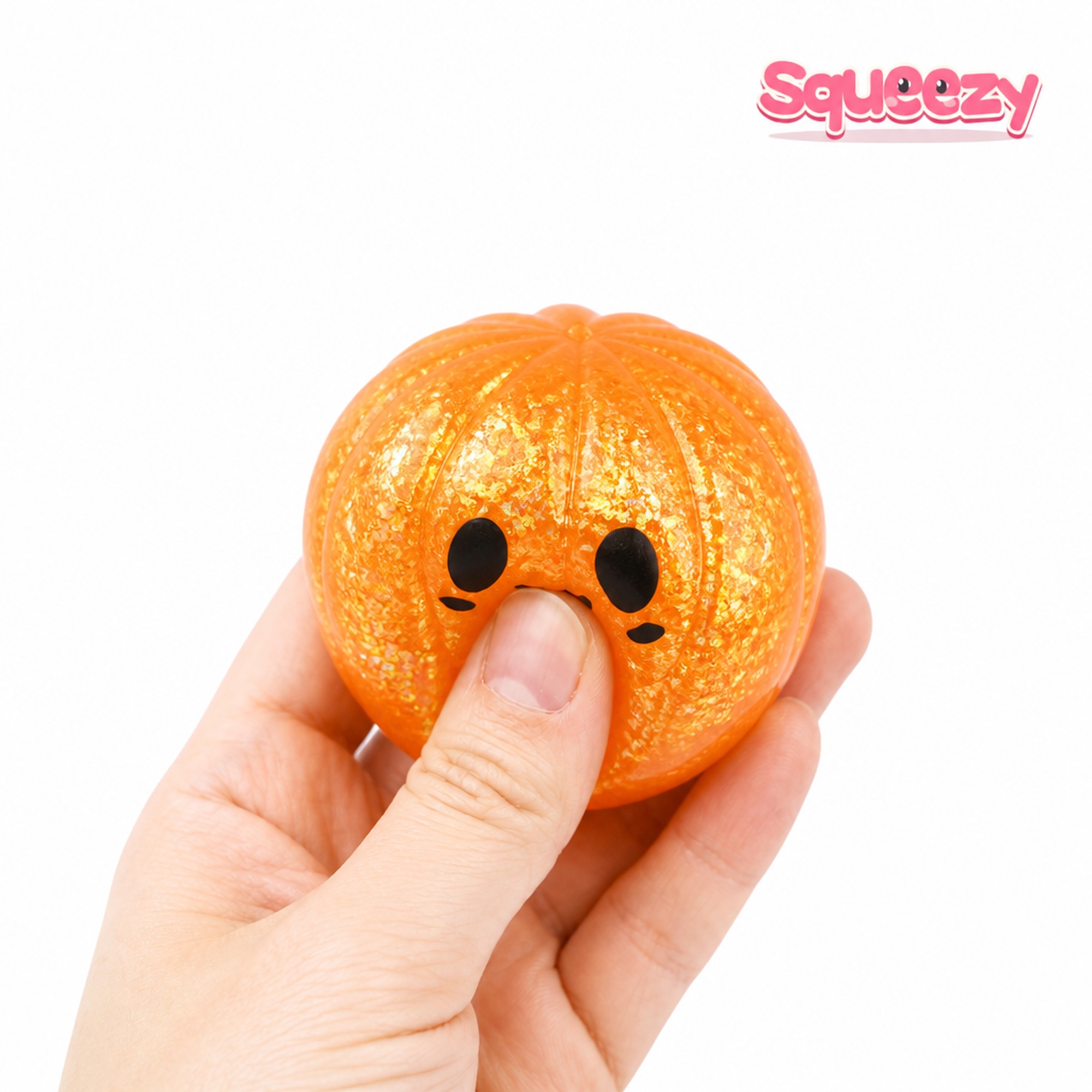 Glitter Pumpkin being squeezed