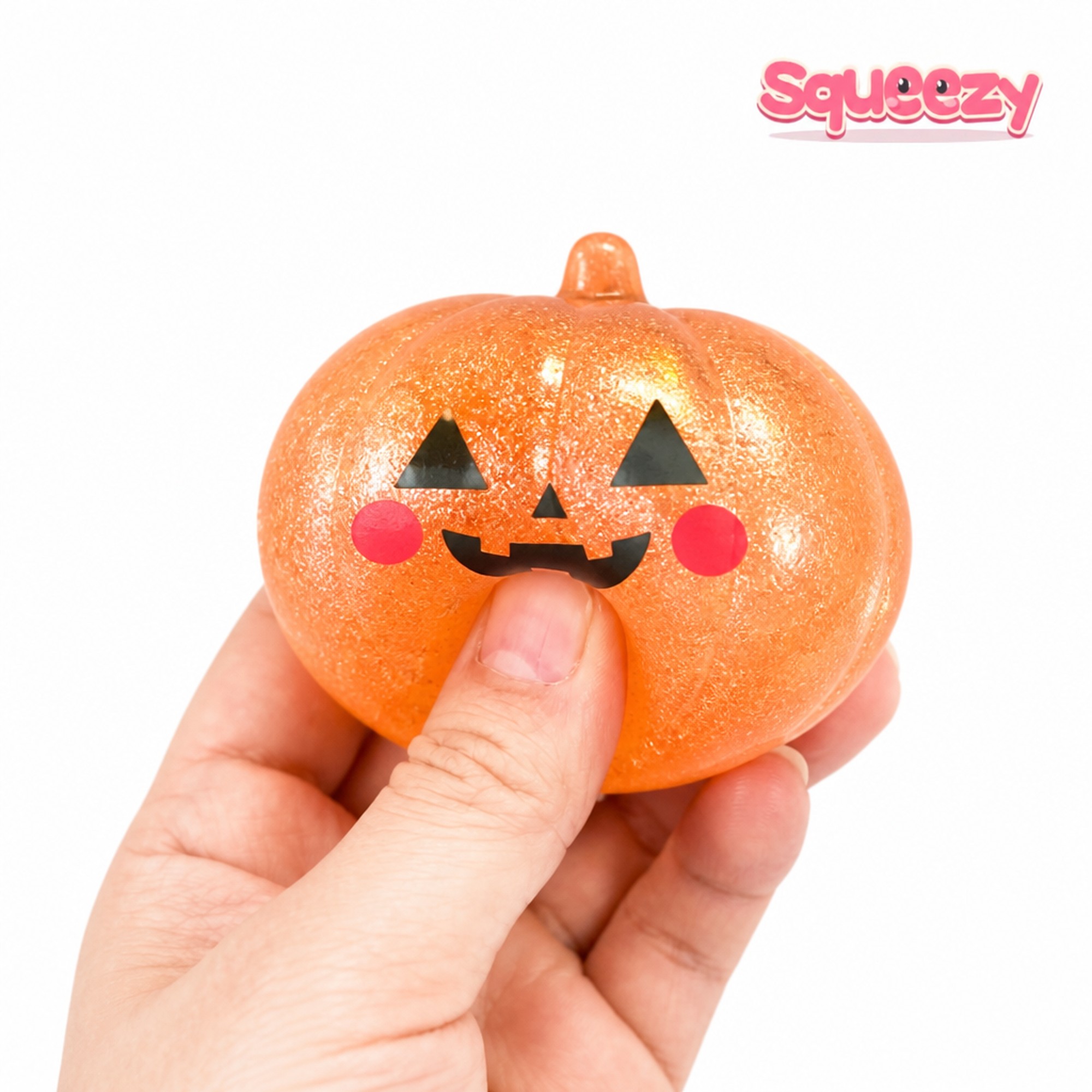 Glitter Pumpkin being squeezed