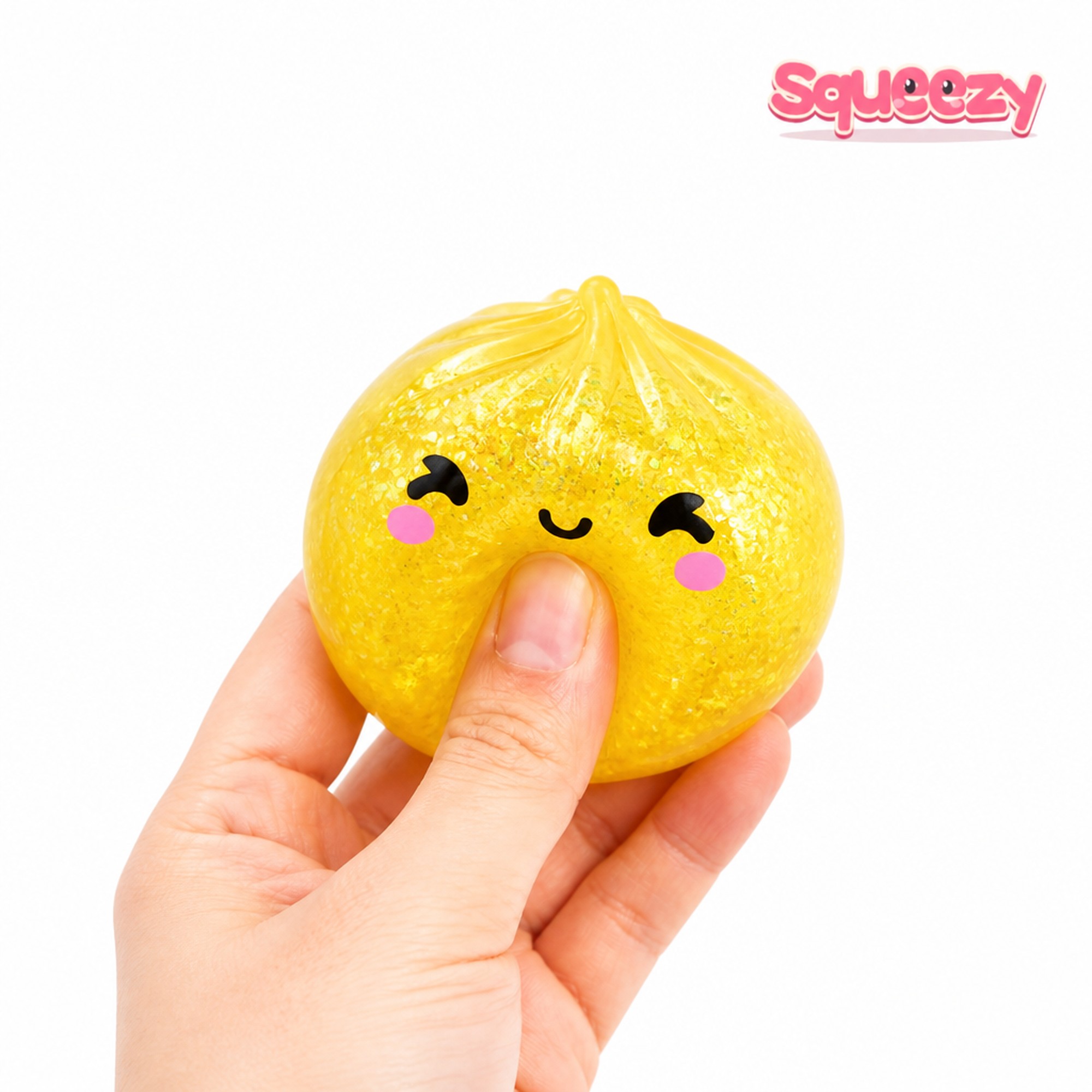 Yellow Sparkle Bao being squeezed