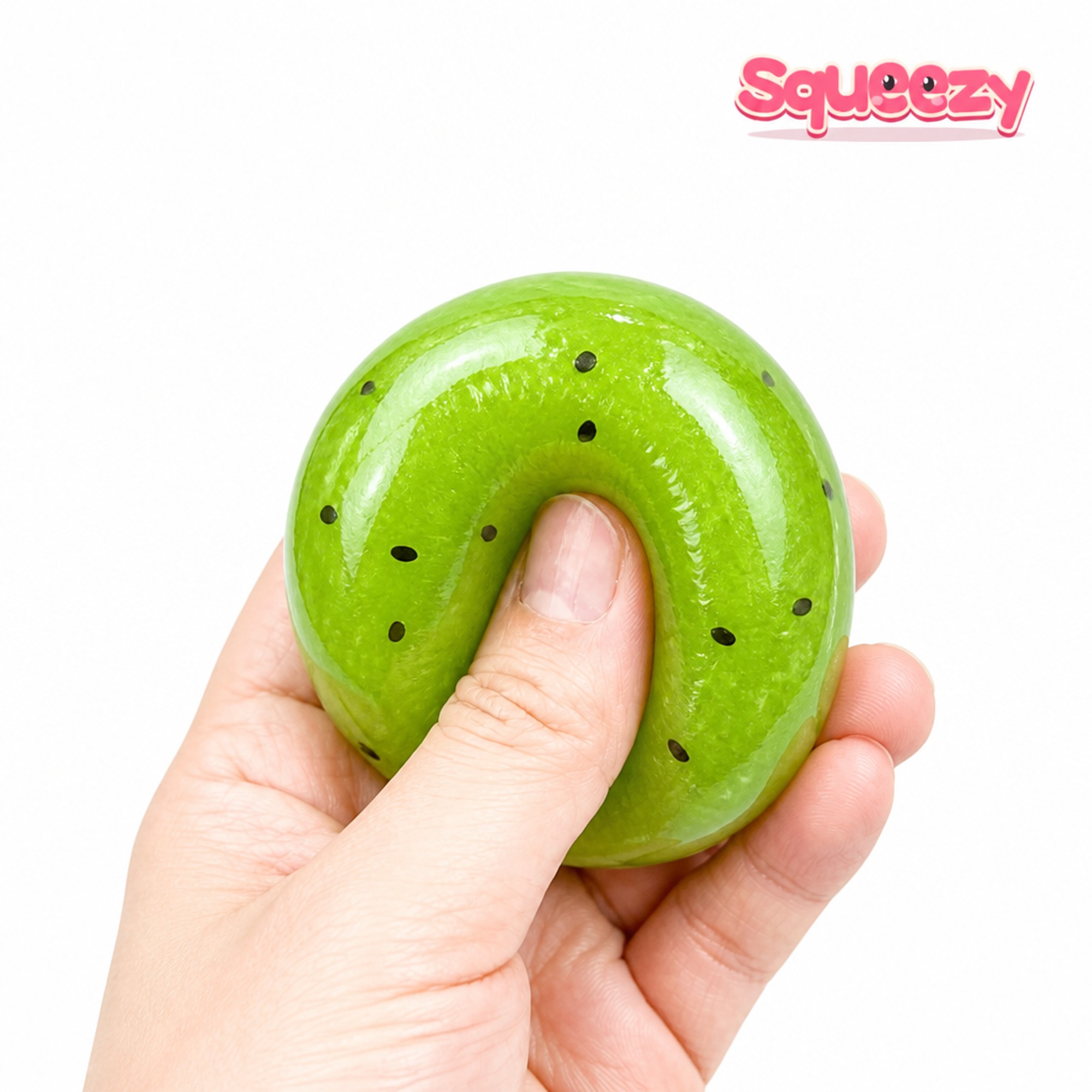 Kiwi Seed Ball being squeezed