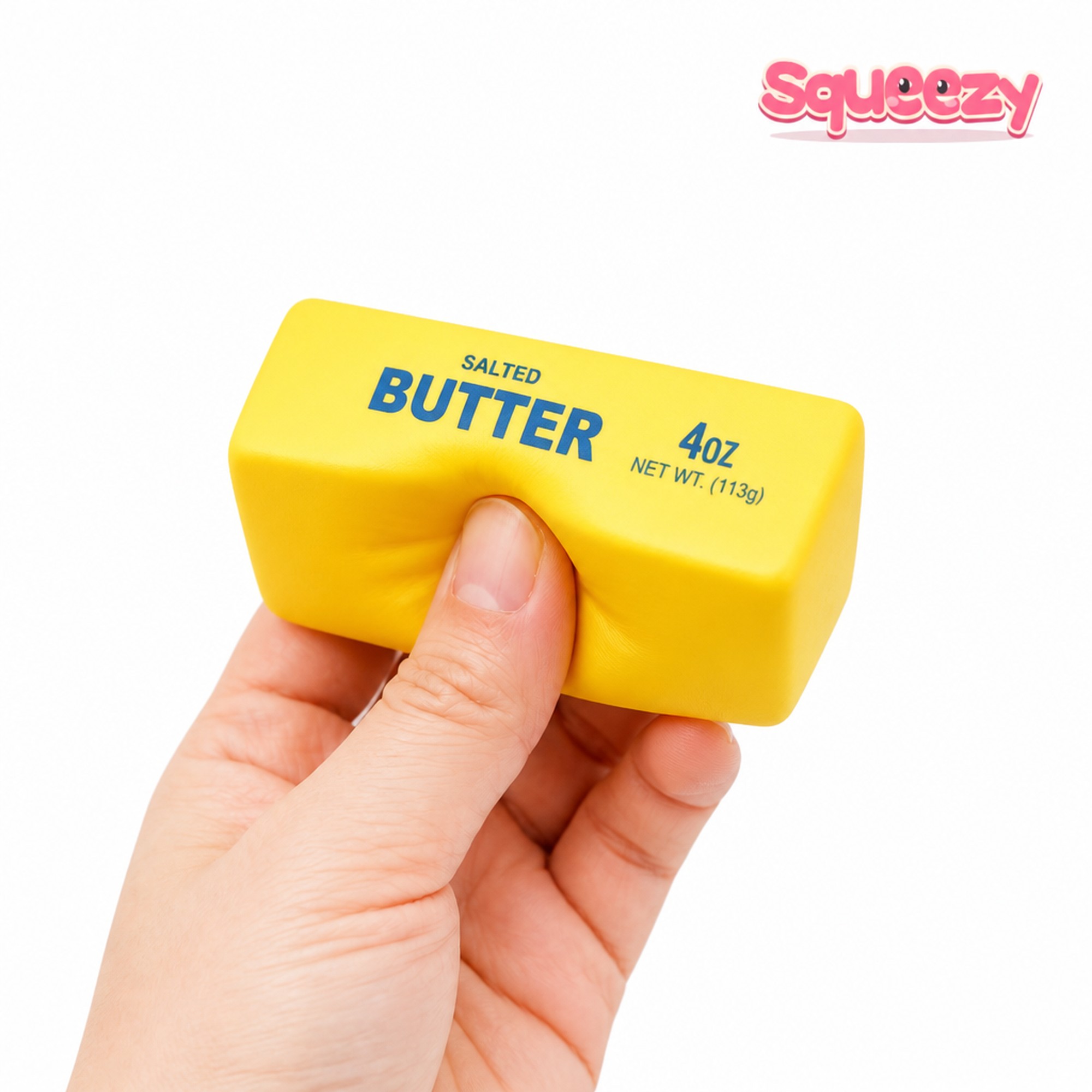 Yellow Butter Stick being squeezed