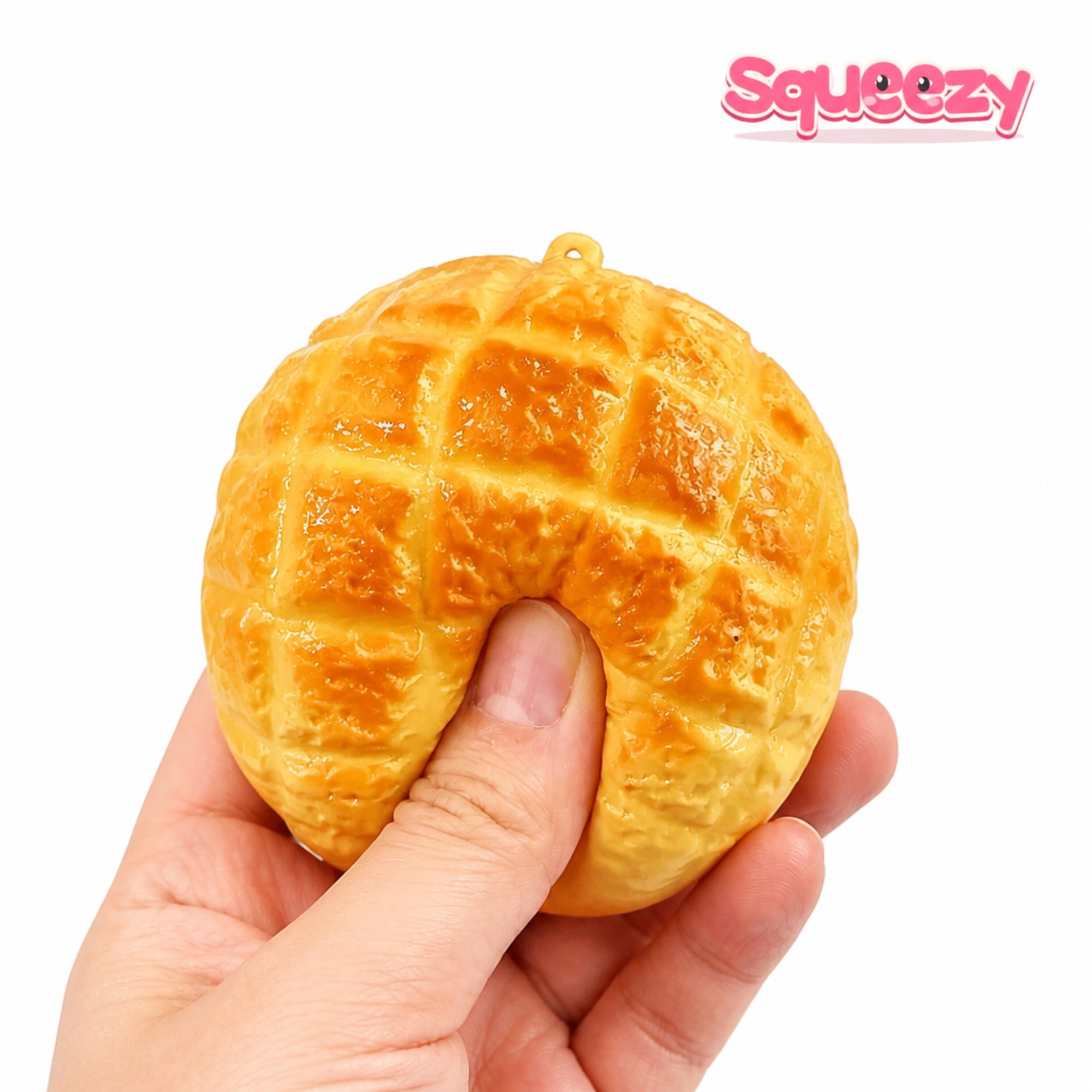 Pineapple Bun being squeezed