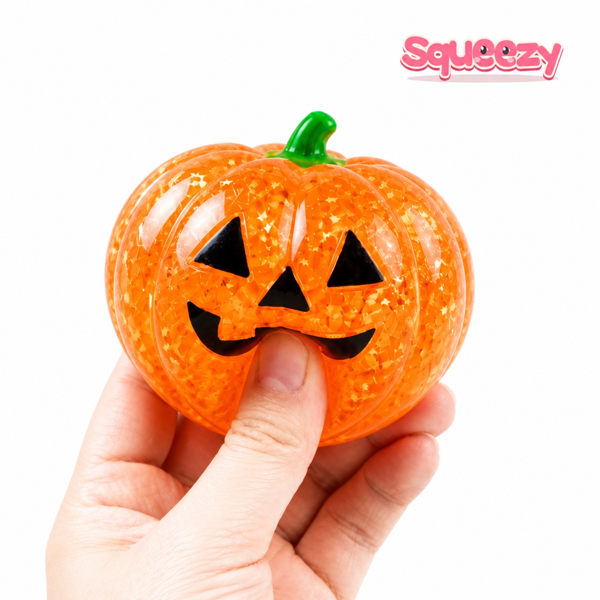 Orange Pumpkin being squeezed