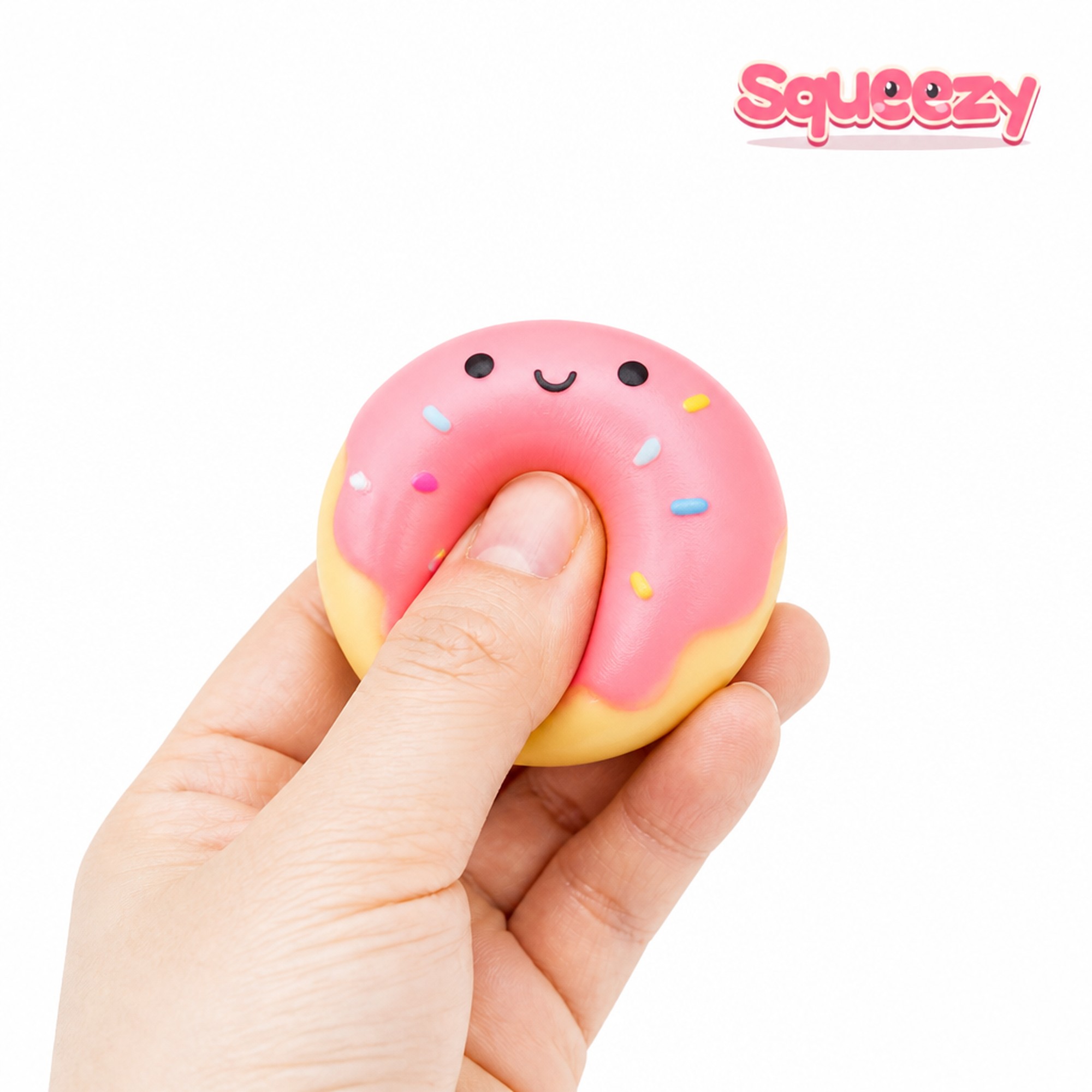 Mini Pink Donut being squeezed