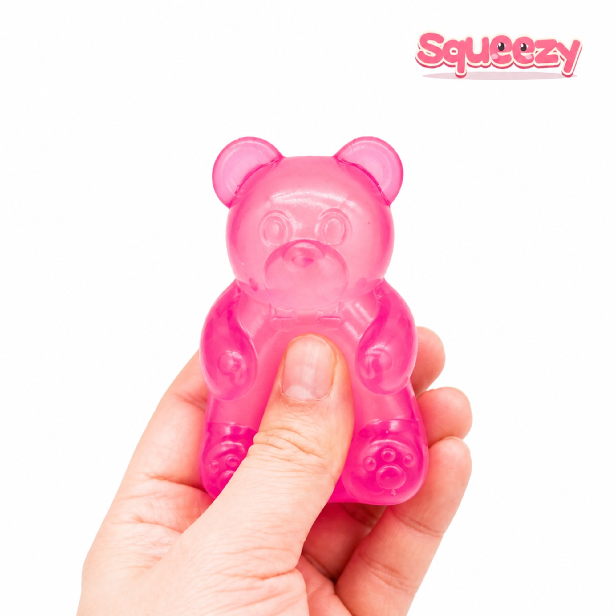 Pink Jelly Bear being squeezed