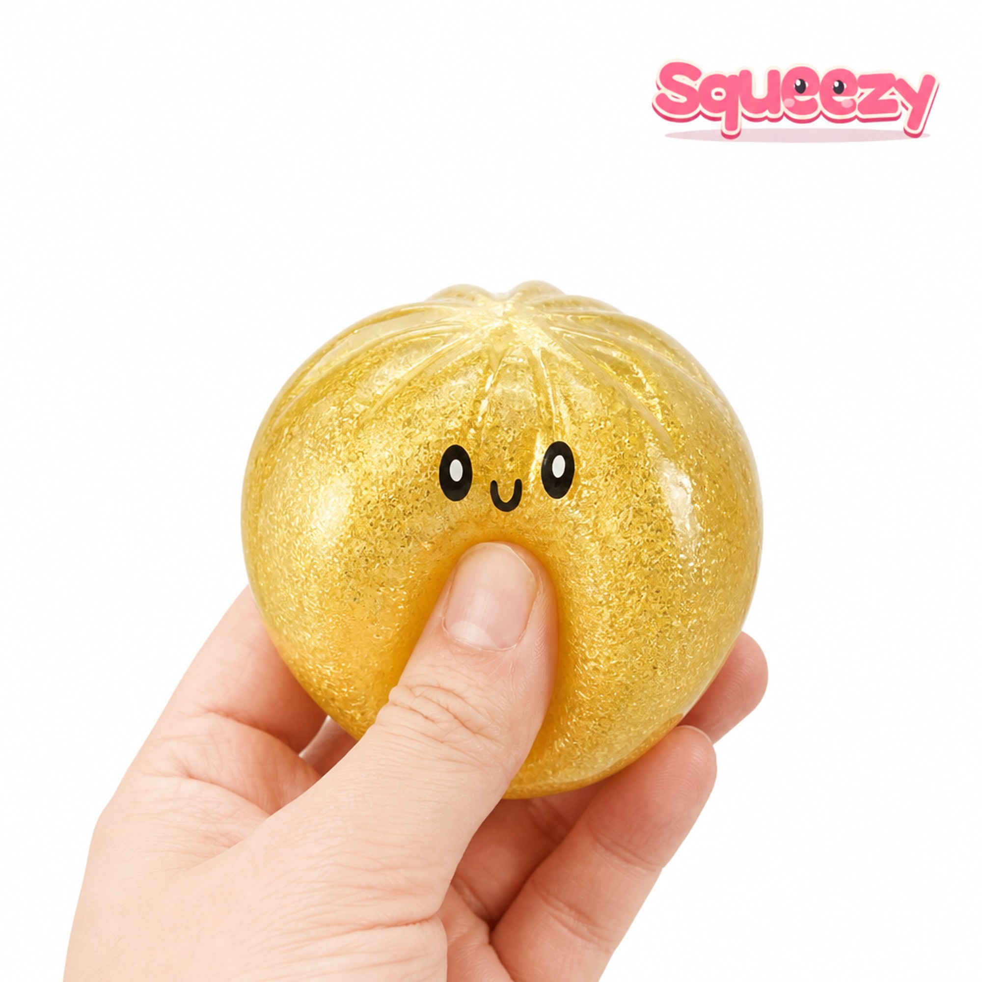 Gold Glitter Bao being squeezed