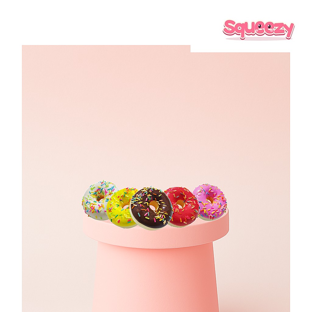 Donut Squishy being squeezed