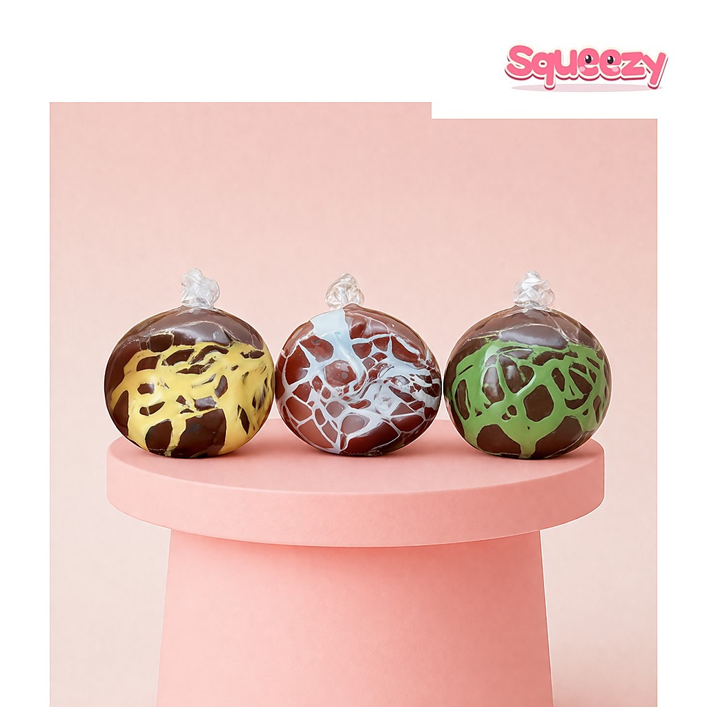 Crunchy Chocolate squishy Handmade Ball being squeezed