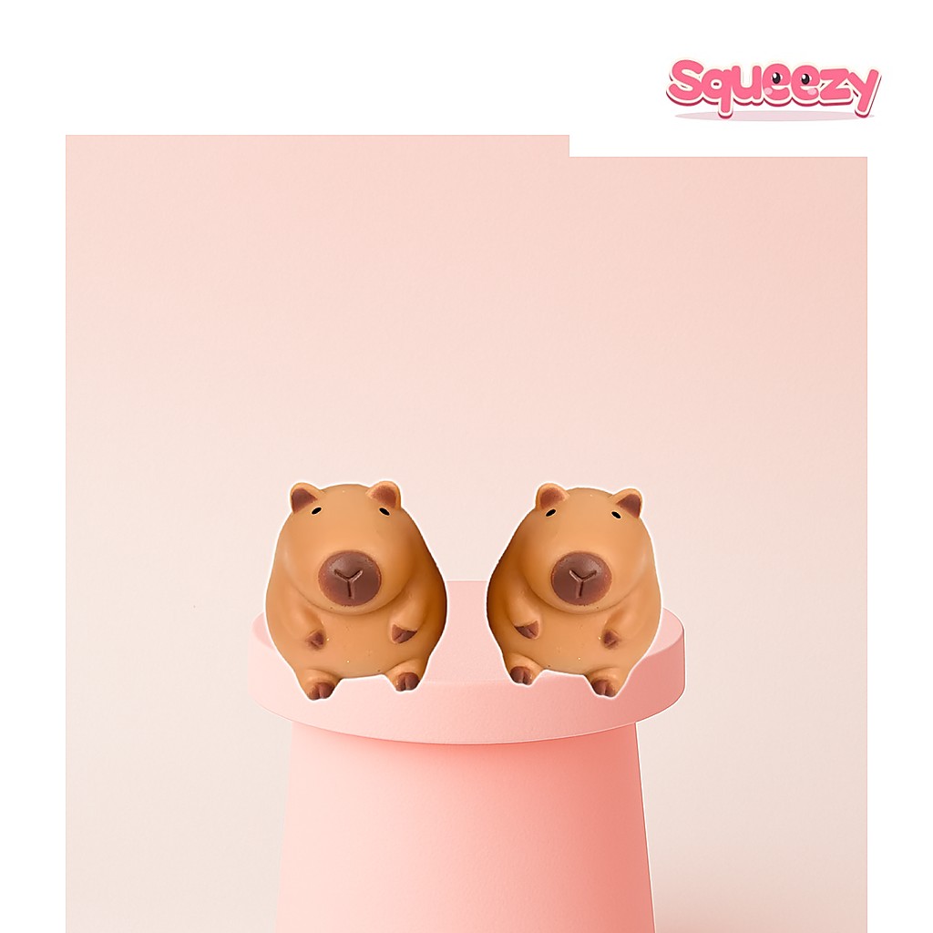 Cute Cartoon Capybara Mochi being squeezed