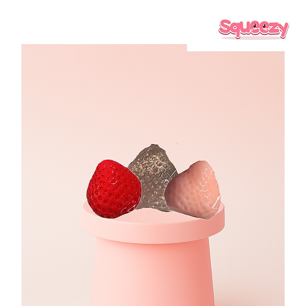 Strawberry Squishy being squeezed