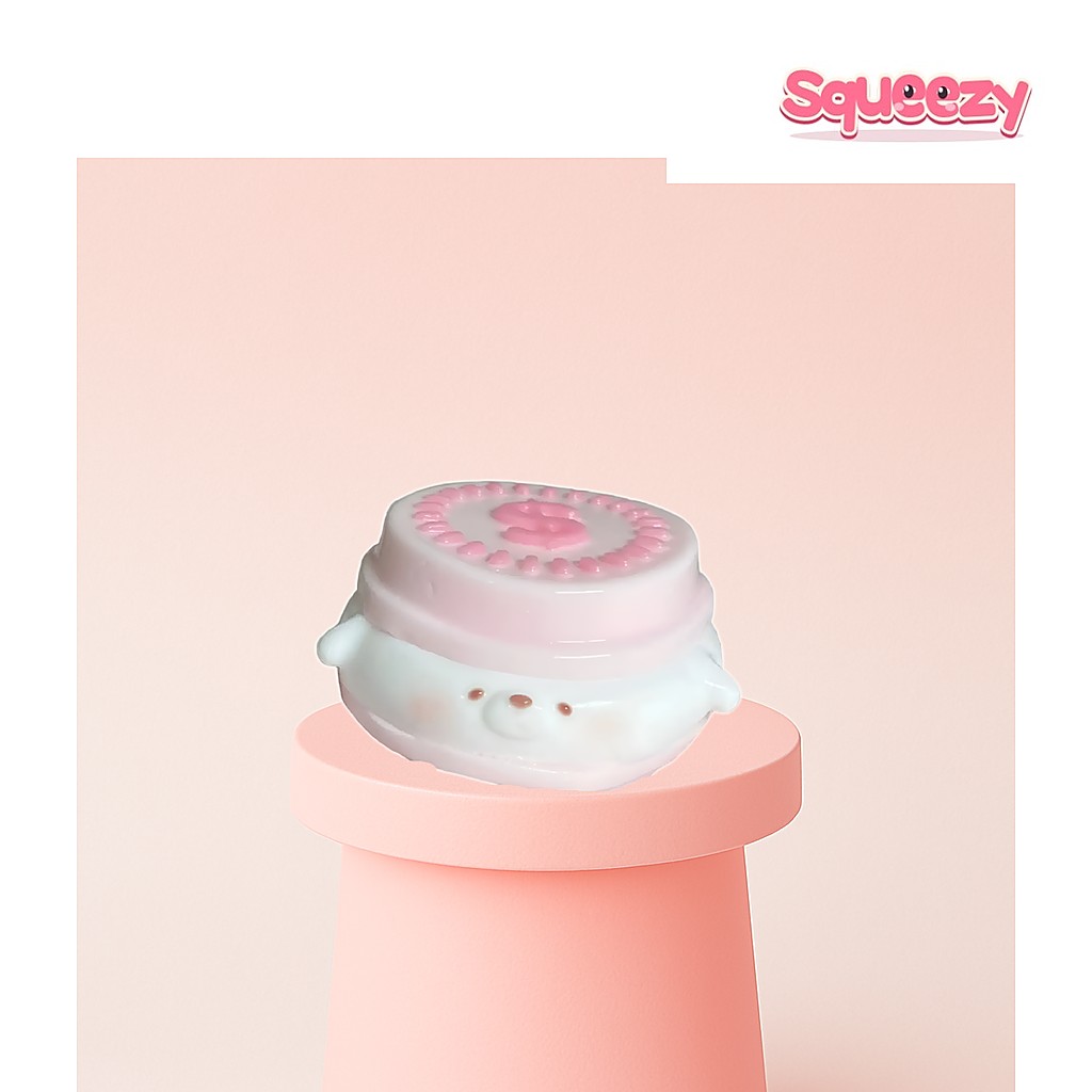 Big Cake Squishy being squeezed