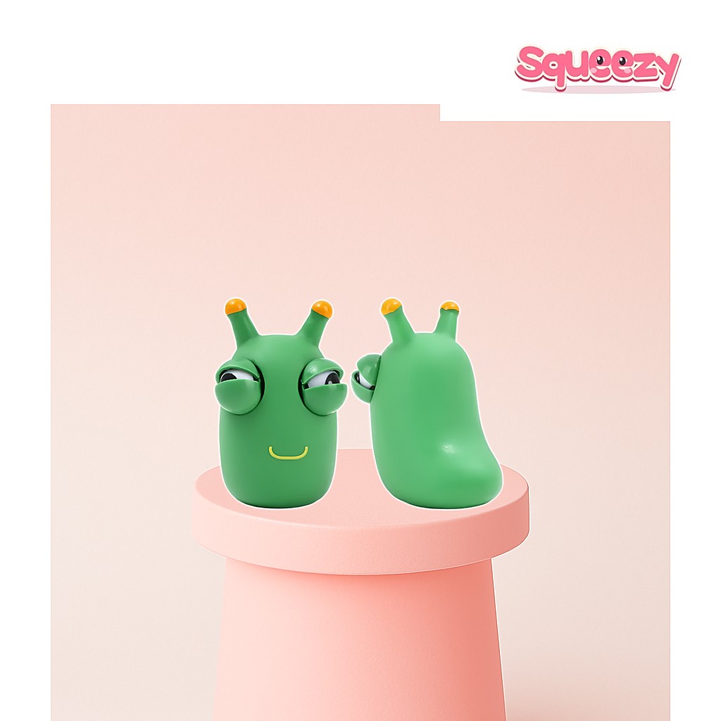 Green Worm Eye Popping Squishy being squeezed