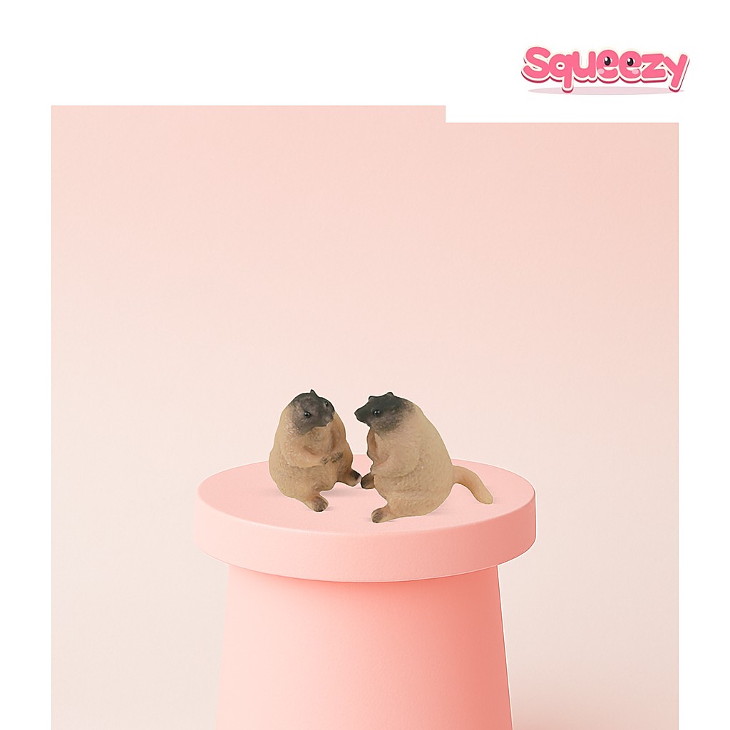 Groundhog Squishies being squeezed