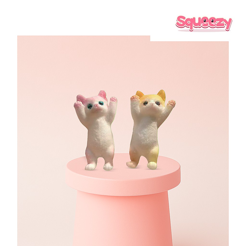 Hands-Up Cat Squishies Small Size being squeezed