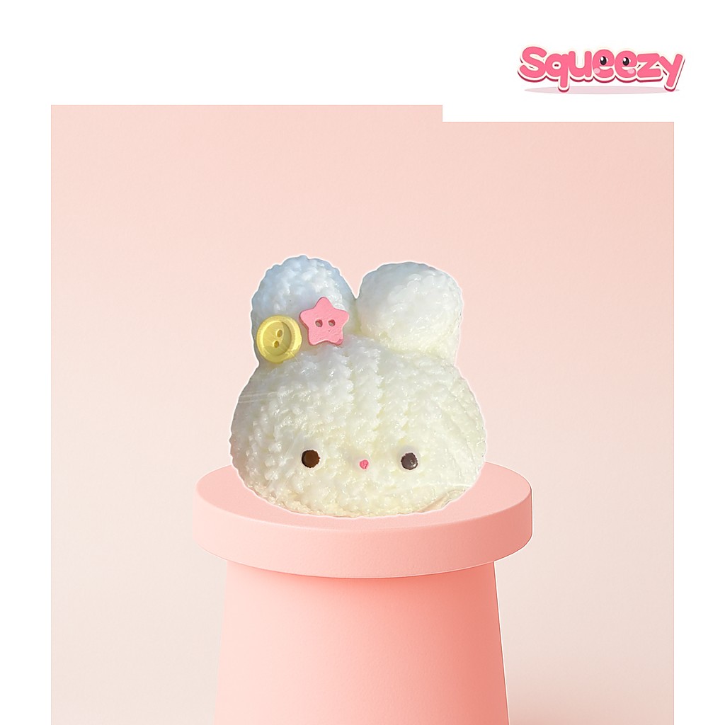 Hello kitty Squishy being squeezed