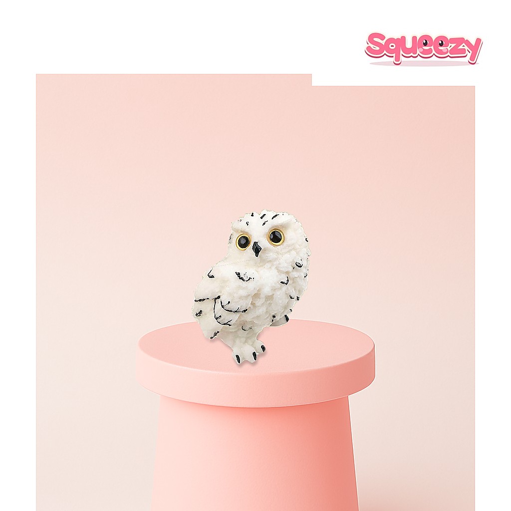 Jumbo Owl being squeezed