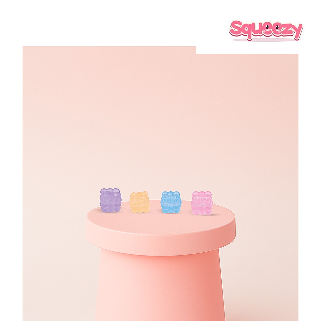 Marshmallow Maltose Cube Glitter Cube being squeezed