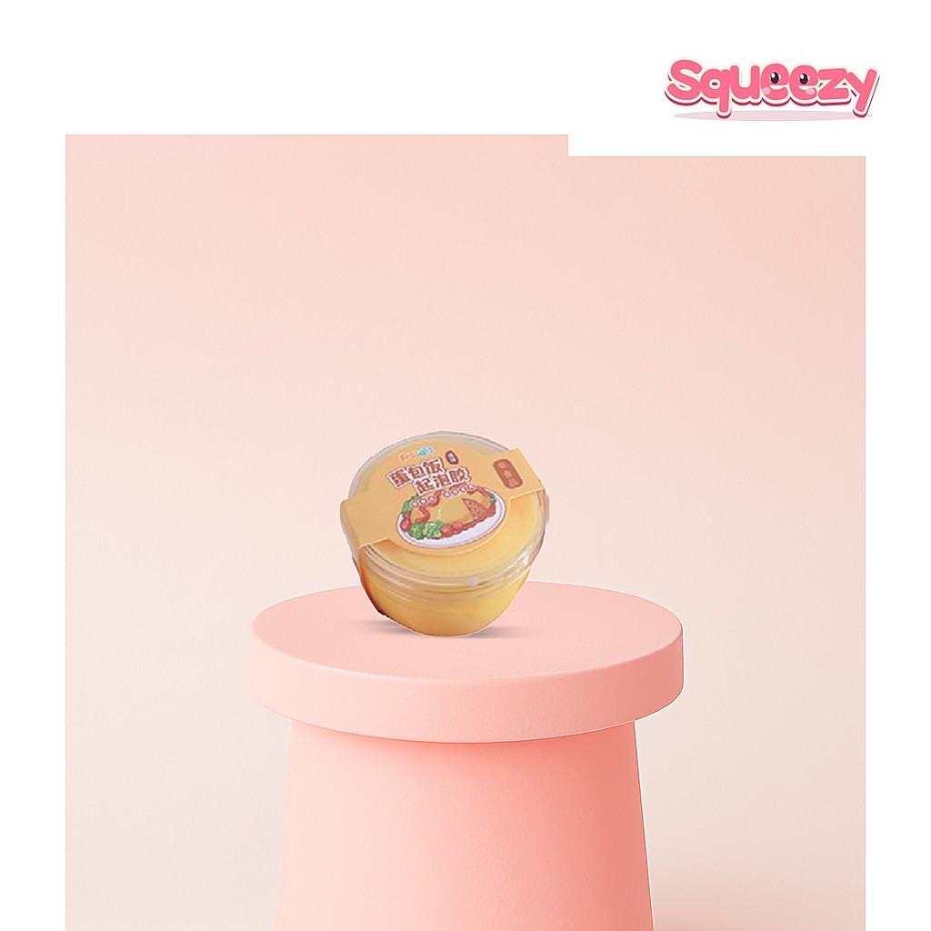Omelette Slime Breakfast-Themed Slime being squeezed