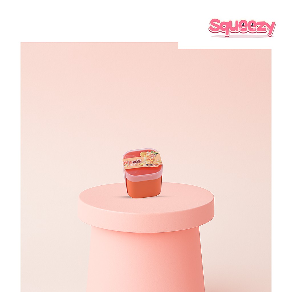 Orange Juice Slime Orange Drink Scented Slime being squeezed