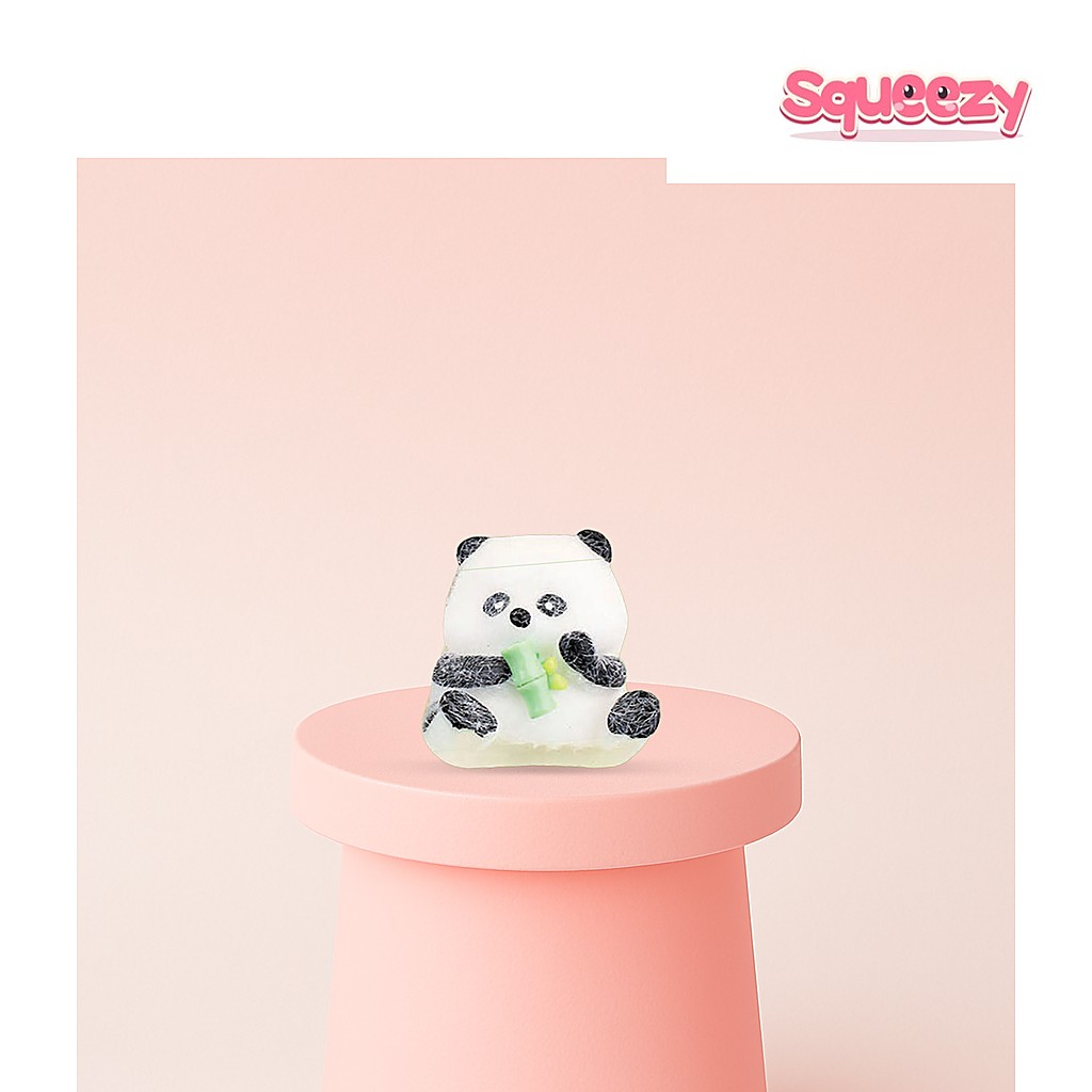 Panda Squishy being squeezed