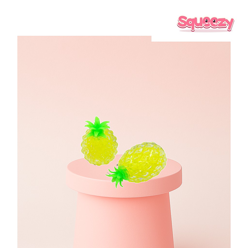 Pineapple Ball being squeezed