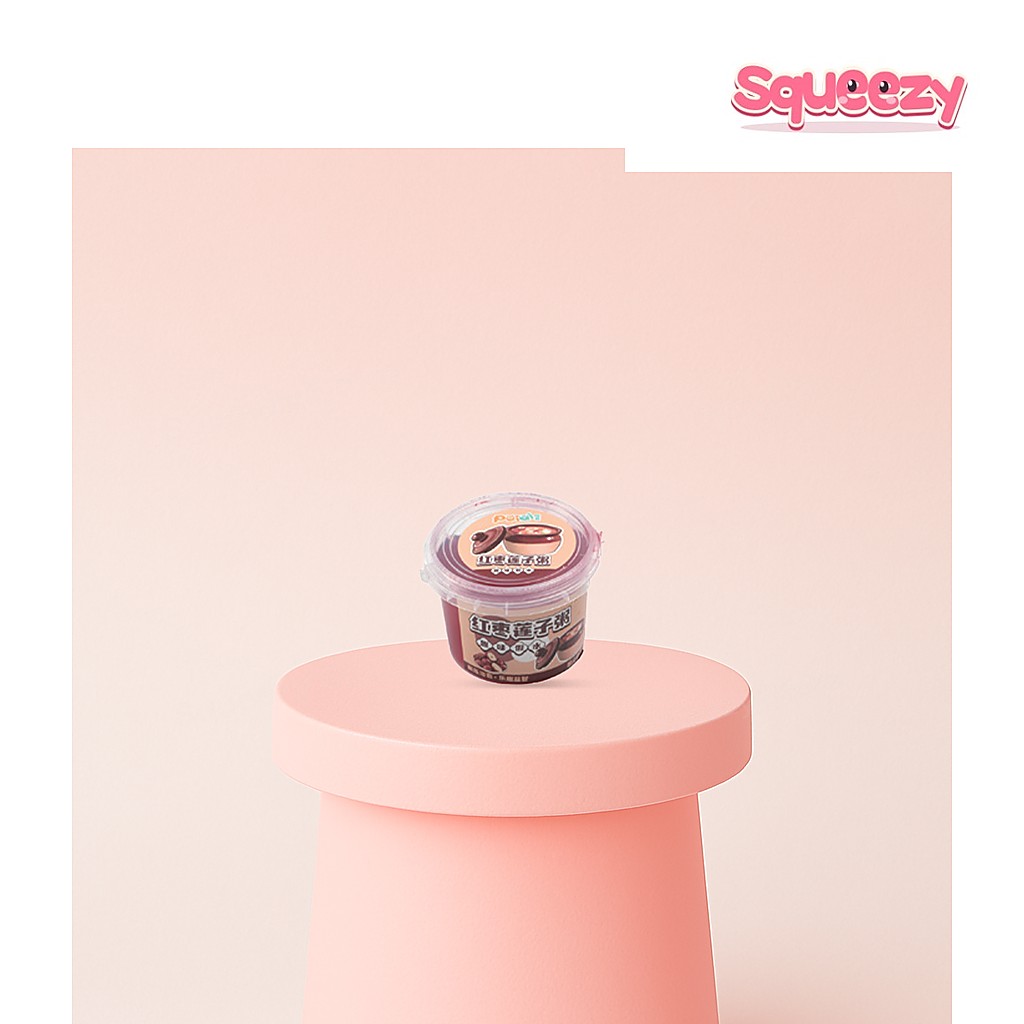 Red Date and Lotus Seed Bubble Putty Dessert Slime being squeezed