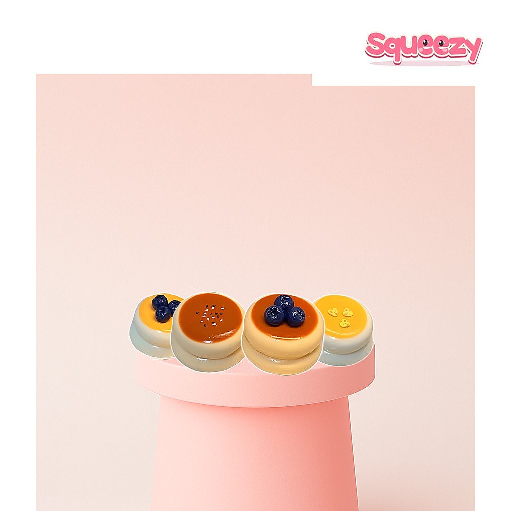 Soufflé Cream Squishy Stress Toy being squeezed