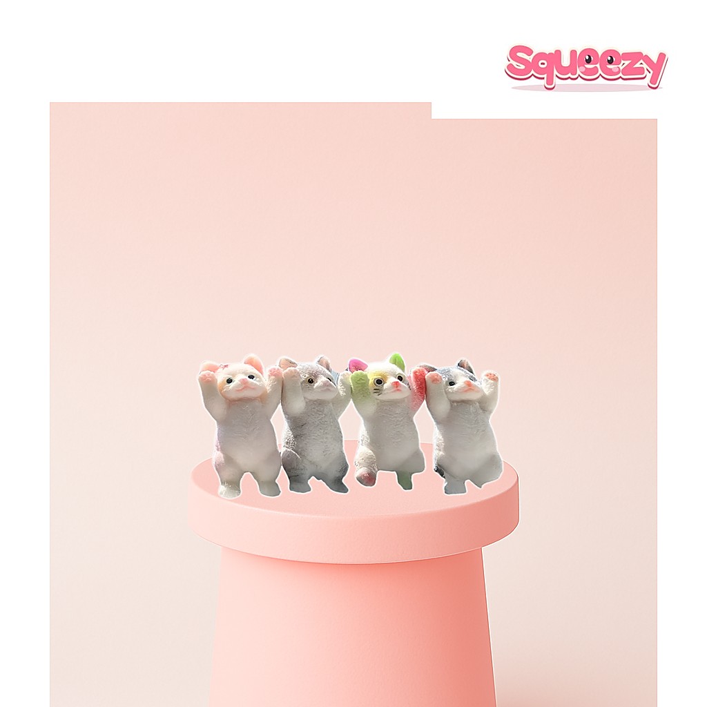 Cat Squishy Stress Toy being squeezed