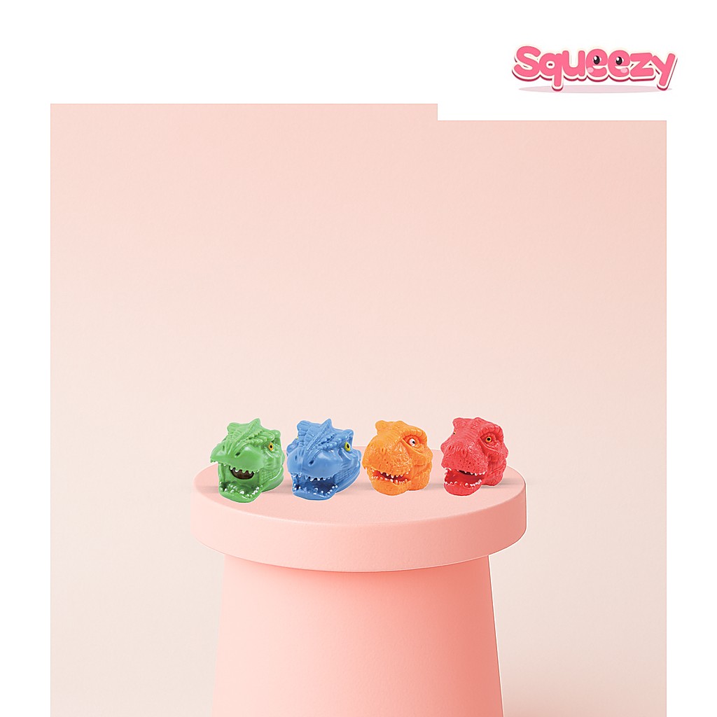 Squishy Dino Head with Beads Soft being squeezed