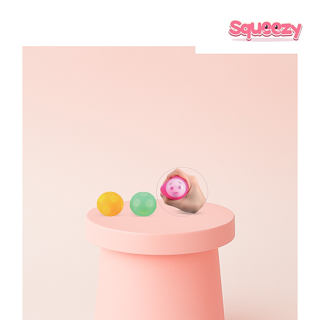 Squishy Emoji Face Ball Funny Face being squeezed