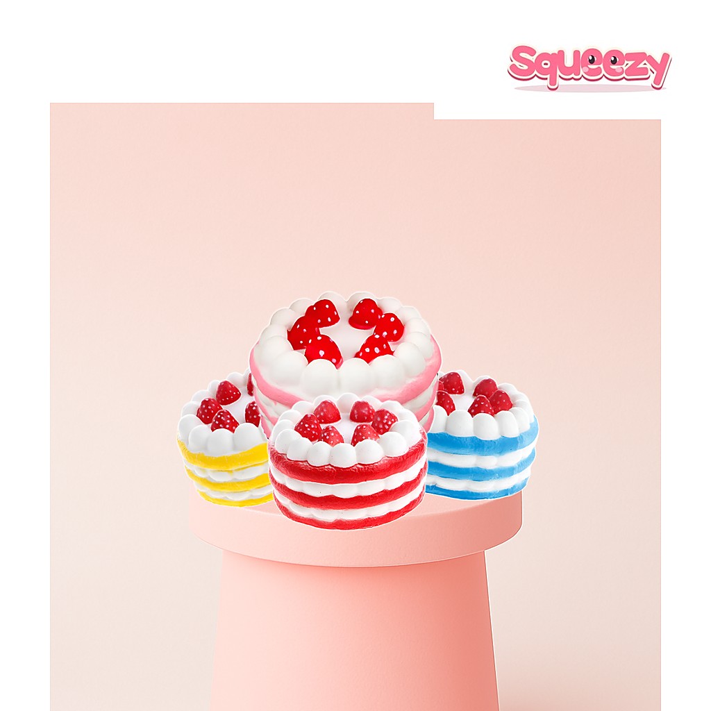 Jumbo Strawberry Cake Squishy Stress Toy being squeezed