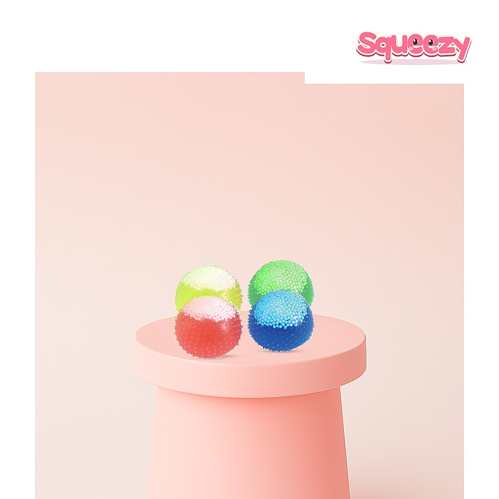 Squishy Spiky Ball Soft Nubby being squeezed