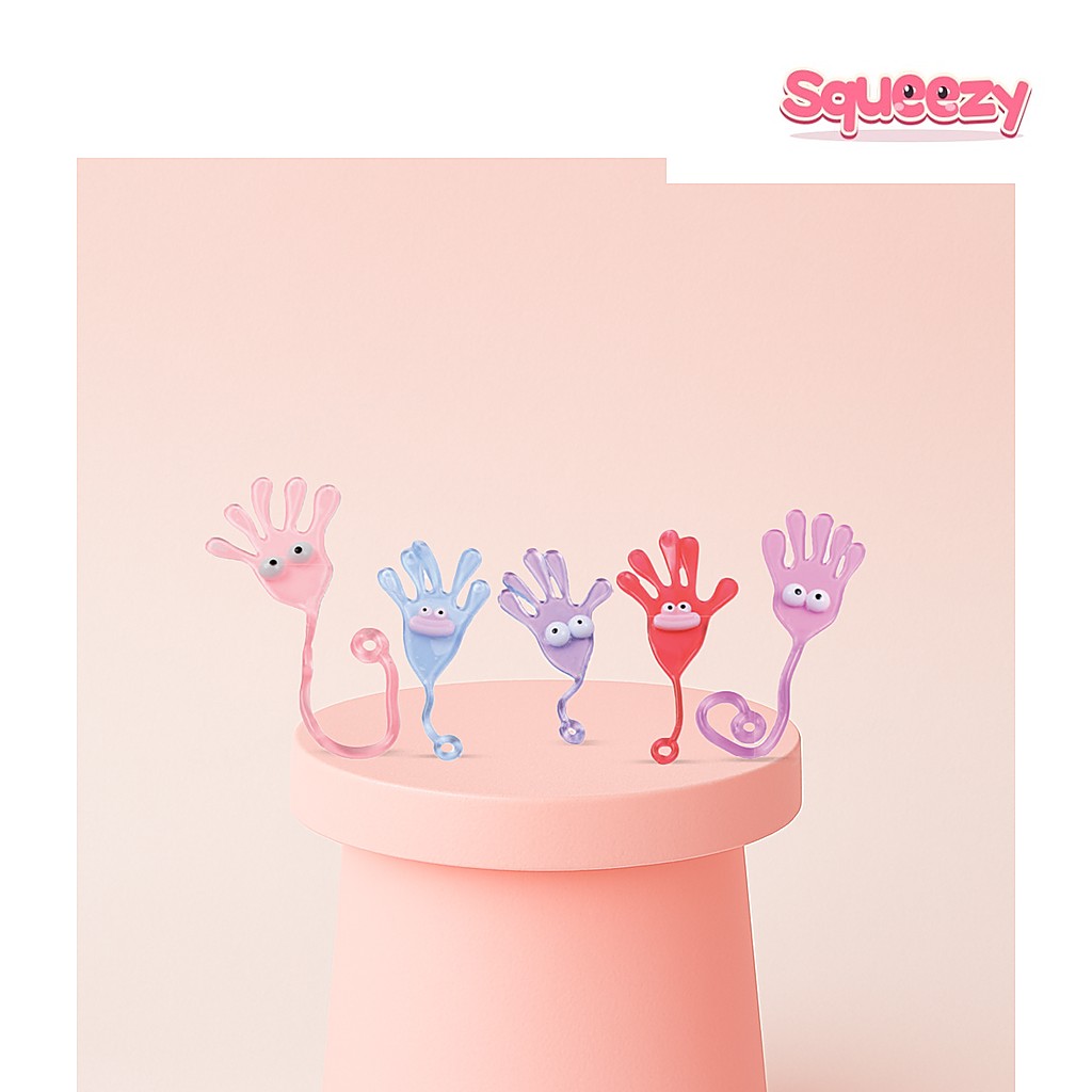Sticky Palm with Yoyo and Emoji Face Stretchy Hand Slap Toy being squeezed