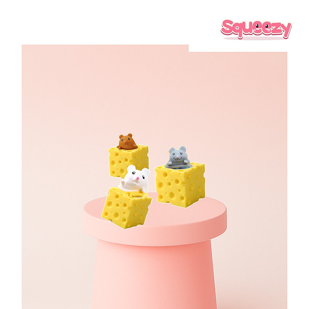 Cheese Mouse Squeeze Toy being squeezed